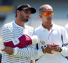 Indian spinners Harbhajan Singh and Murali Kartik during a practice session in Hobart on Wednesday.