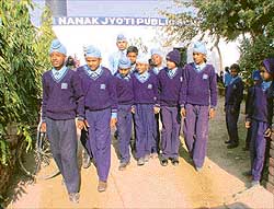 Students of Nanak Jyoti Public School, Mundi Kharar coming out of the school.