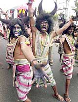 Andhra Pradesh state CPM activists dressed as demons demonstrating against TDP government 