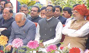 Madan Lal Khurana in a thoughtful mood at the venue of birthday celebrations of Prime Minister Atal Behari Vajpayee. He is flanked by Mr Vijay Kumar Malhotra, Mr Lal Bihari Tiwari and Mr Sahib Singh Verma, who are all attention.