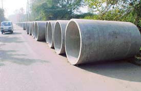 Sewerage pipes lying on the Kishangarh road pose a traffic hazard.