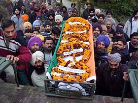 The coffin of Sergeant Ranjot Singh being carried to the cremation ground in Patiala