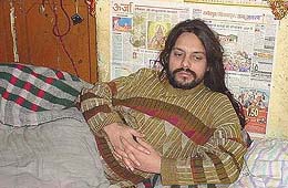 Kishori Lal of Hamirpur who has been confined to bed due to a spinal injury.