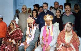 Two girls belonging to economically weak families with their spouses at Gurdwara Singh Sahba in Ludhiana