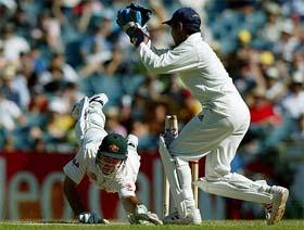 Ricky Ponting is stumped by wicketkeeper Parthiv Patel for 257 runs