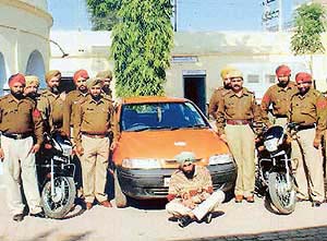 Pargat Singh Rajasthani (sitting), who has been arrested by the Raekot police for alleged involvement in bank dacoity and stealing vehicles. 