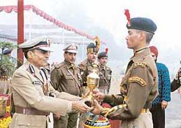 The Director-General, ITBP, Mr R.C. Aggarwal, hands over the award for �best trainee� to CT/GD Ravinder Sharma at the Bhanu Training Centre, ITBP, at Bhanu.