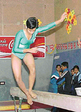 A gymnast loses balance during an event at the 44th Senior National Gymnastics Championship