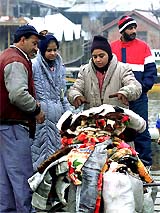 Tourists buy woollen clothing on a chilly Tuesday morning in Srinagar