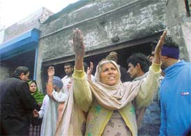 A woman protests against the demolition of shops at Gill Chowk in Ludhiana