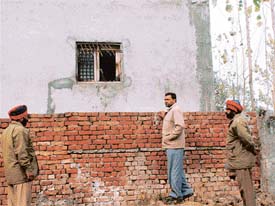 The window on the rear wall of the Allahabad Bank building that was used by the burglars to gain access into the bank