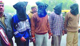 The four criminals, who were arrested by a special team of South Delhi police, being produced at Patiala House in the Capital