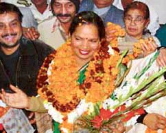 Ms Kamlesh Kumari in a cheerful mood after being elected city Mayor at the Municipal Corporation Office in Chandigarh on Thursday.