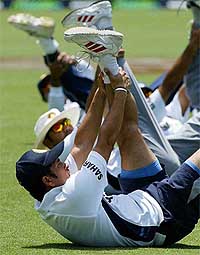 Sachin Tendulkar stretches leg muscles at the Sydney Cricket Ground on the eve of the fourth and final Test against Australia 