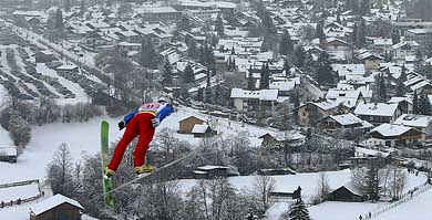 Norway's Sigurd Pettersen soars through the air at the 52nd Four Hill Skiing tournament in the south German town of Garmisch Partenkirchen