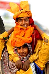 Two young musicians wait for their turn in Islamabad 