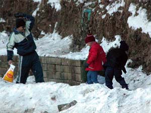 Tourists enjoy the Snow at Kufri near Shimla on Friday