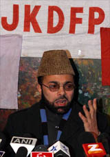 Chairman of Jammu and Kashmir Democratic Freedom Party, Salim Geelani, addresses a press conference in Srinagar