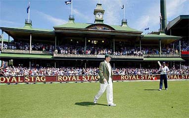 Australian captain Steve Waugh walks past the members stand as he makes his way out for the toss on the first day of the fourth Test against India 