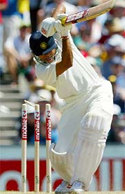 Akash Chopra is bowled by Brett Lee during the first day of the fourth Test