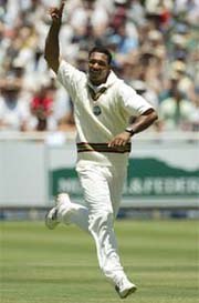 West Indies bowler Adam Sanford celebrates taking the wicket of South African batsman Graeme Smith for 42 
