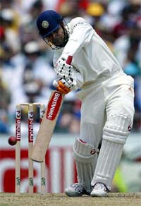 Virender Sehwag hits a four on the first day of the fourth cricket Test