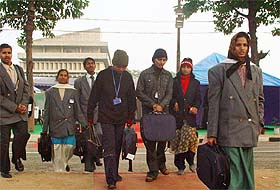 Delegates brave the morning chill to reach the venue of the Indian Science Congress on the Panjab University campus