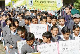 Schoolchildren holding a pulse polio awareness rally in Chandigarh