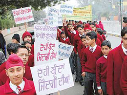 Schoolchildren hold a rally to create awareness regarding the Pulse Polio campaign in Ludhiana on Saturday.