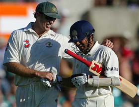 Sachin Tendulkar is congratulated by Mathew Hayden at the end of the second day of the fourth Test