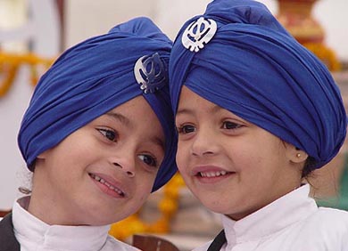 Children wear traditional Sikh outfit to mark the birth anniversary of Guru Gobind Singh Ji