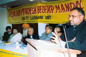 Mr Avinash Rai Khanna, President of the Punjab BJP, addresses a meeting of the Punjab Pradesh Beopar Mandal