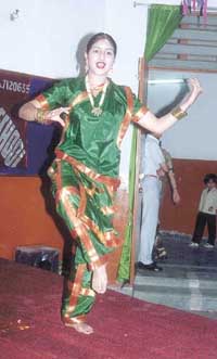 A student strikes a pose in the annual day function of Little Fairy Public School 