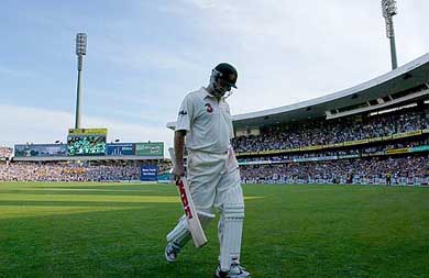 Australian captain Steve Waugh walks off the ground after being dismissed by Irfan Pathan on the third day of the fourth Test in Sydney 