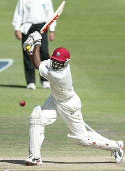 West Indies skipper Brian Lara hits a four against South Africa