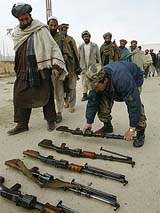 Former Afghan fighters take part in a disarmament programme called Disarmament, Demobilisation and Reintegration 