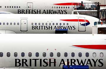 British Airways planes wait on the tarmac at Heathrow Airport in London on Monday. The aviation authorities were on high alert on Monday after several international flights were grounded last week amid fears of another September 11-style terror attack.