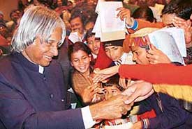 The President of India, Dr APJ Abdul Kalam, shakes hands with school students from all over the country in the city to attend the Children's Science Congress at IMTECH, Sector 39