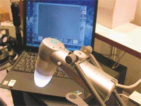 The hand-held digital microscope on display at the �Pride of India� exhibition at Panjab University