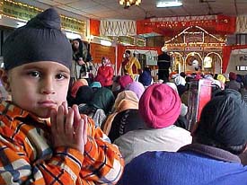 Devotees pay obeisance at the Shimla Gurdwara on the occasion of the 338th birth anniversary of Guru Gobind Singh