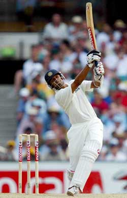Rahul Dravid hoists Australian bowler Nathan Bracken for a six 