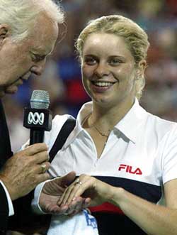 Belgium's Kim Clijsters, currently ranked No 2 in the world, shows her diamond engagement ring to the public during an interview at the Hopman Cup in Perth