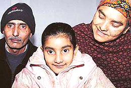 Cheerful Esha, along with her parents
