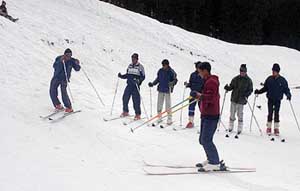 Tourist enjoy skiing in Narkanda following heavy snowfall 