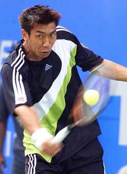 Paradorn Srichaphan of Thailand returns a forehand to Albert Montanes of Spain 
