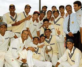Indian players pose with the Border-Gavaskar Trophy after they drew the fourth and final Test against Australia at the Sydney Cricket Ground 