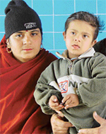 The mentally challenged Bunny and his mother, who is worried about how she would ever manage funds to get her child operated for the hole in the heart. 