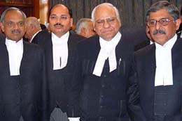 From left: Mr Justice Ajay Kumar Mittal, Mr Justice Surya Kant Sharma, Chief Justice B.K. Roy and Mr Justice Rajive Bhalla after the swearing-in ceremony in Chandigarh on Friday. 