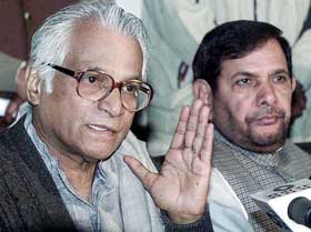 Defence Minister and Janata Dal (U) President George Fernandes, along with another party leader Sharad Yadav, addresses a press conference in New Delhi on Friday.