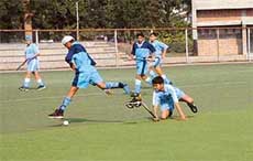 A match in progress in the first district-level hockey tournament
